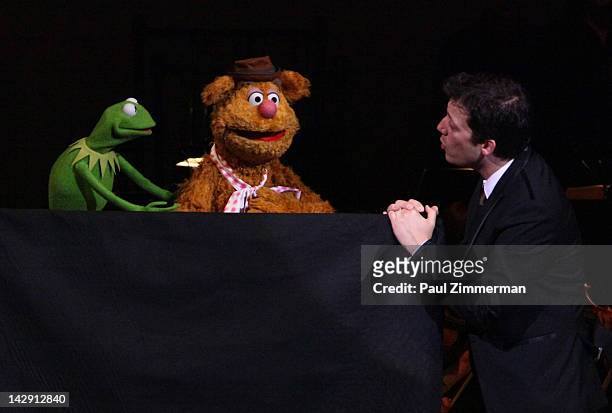 Kermit the Frog, Fozzie Bear and host John Tartaglia perform at The New York Pops Present "Jim Henson's Musical World" at Carnegie Hall on April 14,...