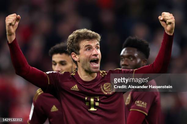 Thomas Muller of Bayern Munich celebrates scoring their side's fourth goal during the Bundesliga match between FC Bayern München and Bayer 04...