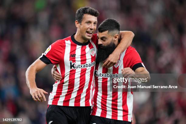 Mikel Vesga of Athletic Club celebrates scoring their side's fourth goal from a penalty with teammates during the LaLiga Santander match between...
