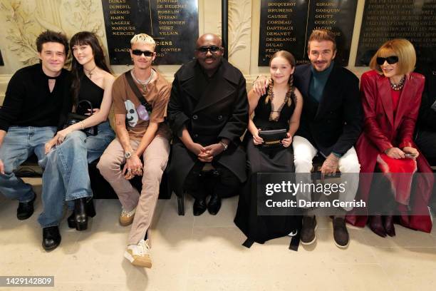 Brooklyn Peltz Beckham, Nicola Peltz Beckham, Romeo Beckham, Edward Enninful, Harper Beckham, David Beckham and Anna Wintour attend the Victoria...