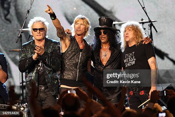 Inductees Izzy Stradlin, Matt Sorum, Duff McKagan, Slash and Steven Adler of Guns N' Roses, perform onstage during the 27th Annual Rock And Roll Hall...