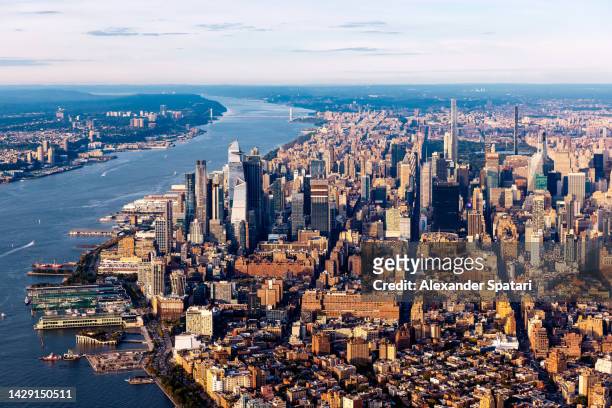 new york city skyline on a sunny day, aerial view, usa - aerial view of mid town manhattan new york stock pictures, royalty-free photos & images