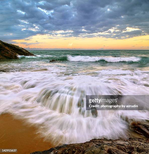 waves on beach - high speed stock pictures, royalty-free photos & images