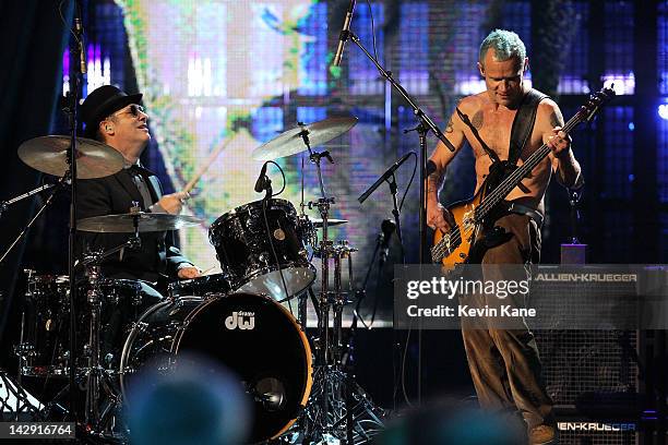 Inductees Cliff Martinez and Michael Balzary aka Flea of Red Hot Chili Peppers perform on stage during the 27th Annual Rock And Roll Hall Of Fame...