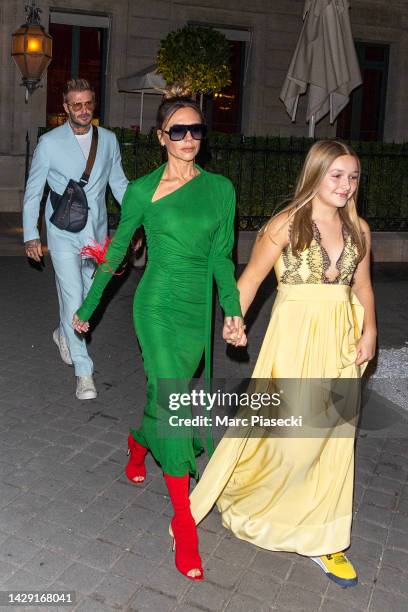 David Beckham, Victoria Beckham and Harper Beckham are seen on September 30, 2022 in Paris, France.