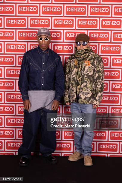 Singer Pharrell Williams and a guest attend the Kenzo Party as part of Paris Fashion Week on September 30, 2022 in Paris, France.