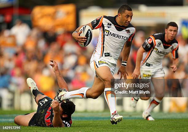 Benji Marshall of the Tigers makes a break during the round seven NRL match between the Penrith Panthers and the Wests Tigers at Centrebet Stadium on...