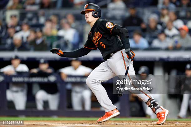 Ryan Mountcastle of the Baltimore Orioles hits an RBI single during the first inning against the New York Yankees at Yankee Stadium on September 30,...