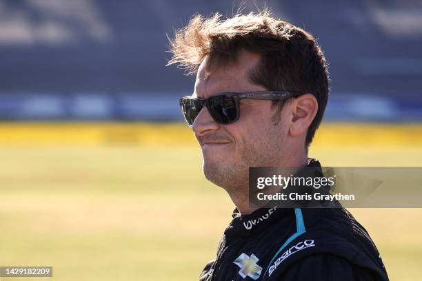 Landon Cassill, driver of the Voyager: Crypto for All Chevrolet, waits on the grid during qualifying for the NASCAR Xfinity Series Sparks 300 at...