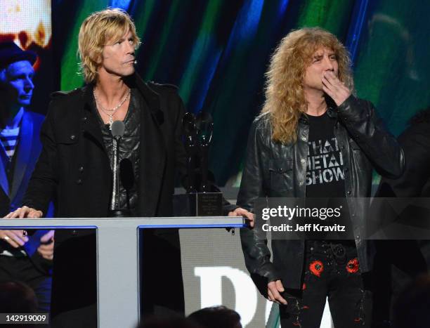 Inductees Duff McKagan and Steven Adler of Guns N' Roses speak on stage at the 27th Annual Rock And Roll Hall Of Fame Induction Ceremony at Public...