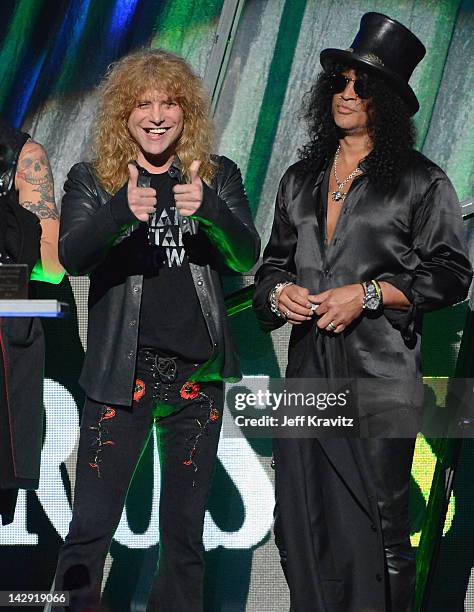 Inductees Slash and Steven Adler of Guns N’ Roses speak on stage at the 27th Annual Rock And Roll Hall Of Fame Induction Ceremony at Public Hall on...