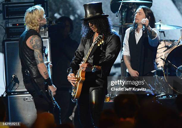 Myles Kennedy performs with inductees Duff McKagan and Slash on stage at the 27th Annual Rock And Roll Hall Of Fame Induction Ceremony at Public Hall...