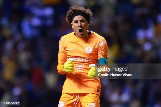 Guillermo Ochoa of America celebrates after his team's second goal during the 17th round match between Puebla and America as part of the Torneo...