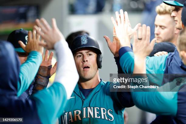 Dylan Moore of the Seattle Mariners scores a run during the first inning against the Oakland Athletics at T-Mobile Park on September 30, 2022 in...