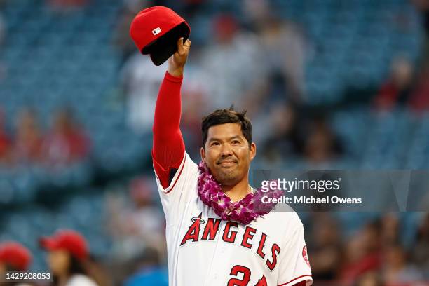 Kurt Suzuki of the Los Angeles Angels salutes to the crowd during his retirement ceremony prior to a game against the Texas Rangers at Angel Stadium...