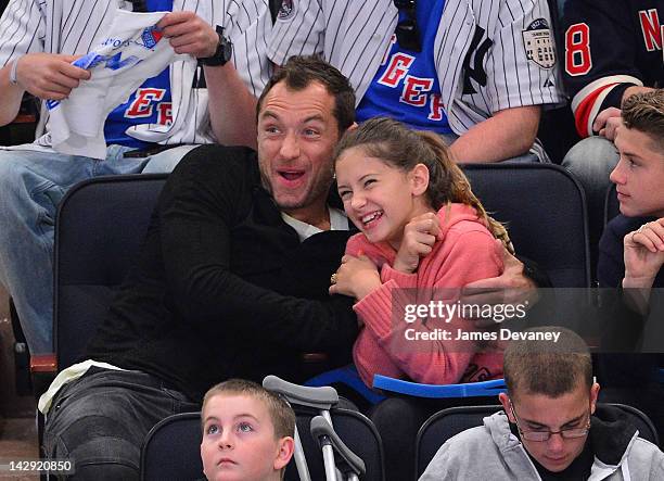 Jude Law and Iris Law attend the Ottawa Senators vs New York Rangers game at Madison Square Garden on April 14, 2012 in New York City.