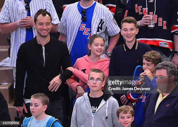Jude Law, Iris Law, Finlay Law and Rudy Law attend the Ottawa Senators vs New York Rangers game at Madison Square Garden on April 14, 2012 in New...