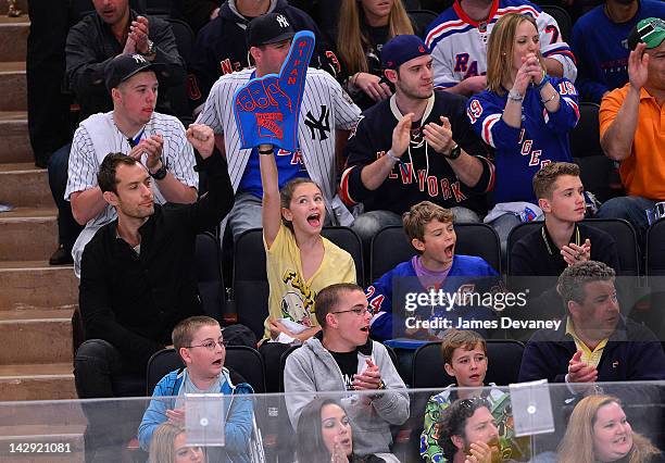 Jude Law, Iris Law, Rudy Law and Finlay Law attend the Ottawa Senators vs New York Rangers game at Madison Square Garden on April 14, 2012 in New...