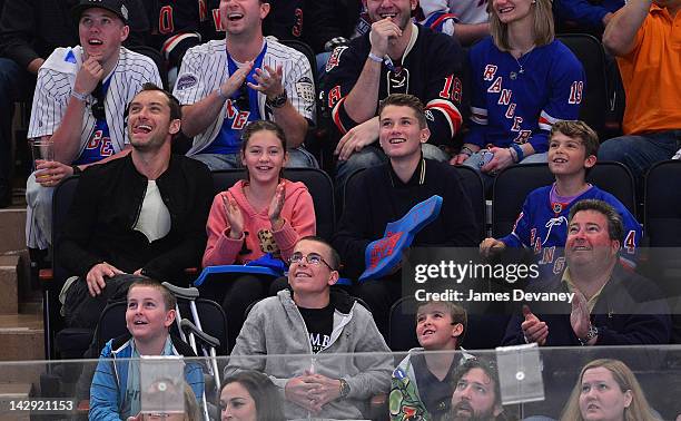 Jude Law, Iris Law, Finlay Law and Rudy Law attend the Ottawa Senators vs New York Rangers game at Madison Square Garden on April 14, 2012 in New...