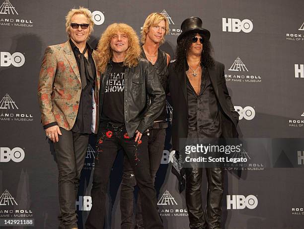 Inductees Matt Sorum, Steven Adler, Duff McKagan and Slash of Guns N’ Roses pose in the press room duringthe 27th Annual Rock And Roll Hall Of Fame...