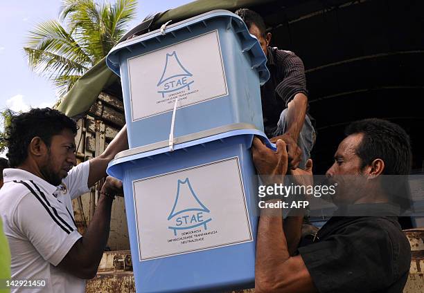 Officials load ballot boxes onto a truck in Dili on April 15 ahead of the second round of the presidential elections to be held on April 16....