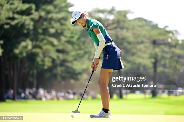 Amateur Saki Baba of Japan holes the birdie putt on the 1st green during the third round of the Japan Women's Open Golf Championship at Murasaki...