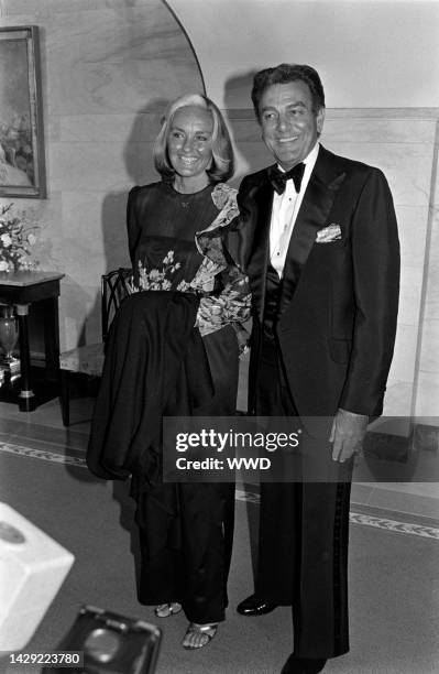 Marylou Connors and Mike Connors attend an event, welcoming the president of Portugal, at the White House in Washington, D.C., on September 15, 1983.