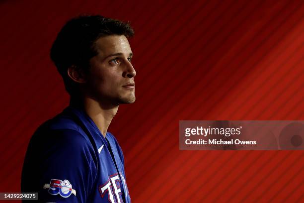 Corey Seager of the Texas Rangers looks on from the dugout during a game against the Los Angeles Angels in the fifth inning at Angel Stadium of...