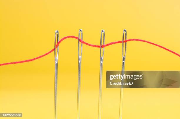 networking - sewing needle stock pictures, royalty-free photos & images