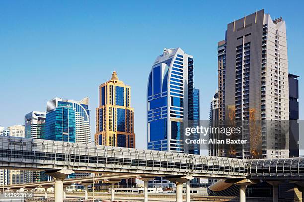 skyscrapers at dubai marina - dubai bridge stock pictures, royalty-free photos & images