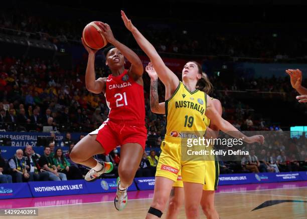 Nirra Fields of Canada drives to the basket against Sara Blicavs of Australia during the 2022 FIBA Women's Basketball World Cup 3rd place match...