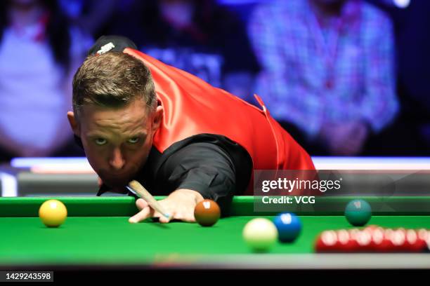 Jamie Jones of Wales plays a shot in the quarter-final match against Noppon Saengkham of Thailand on day five of the 2022 Cazoo British Open at...