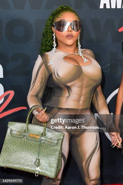 Lil Kim attends the 2022 BET Hip Hop Awards at Cobb Energy Performing Arts Center on September 30, 2022 in Atlanta, Georgia.