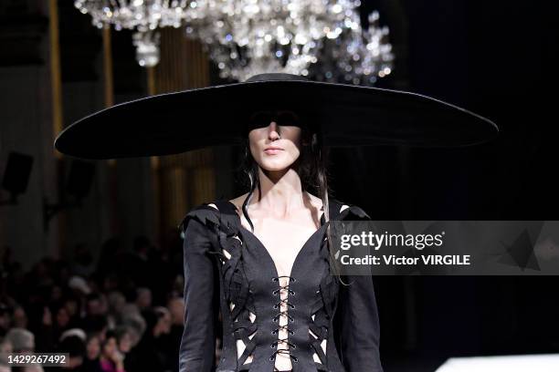 France A model walks the runway during the Yohji Yamamoto Ready to Wear Spring Summer 2023 show as part of the Paris Fashion Week on September 30th,...