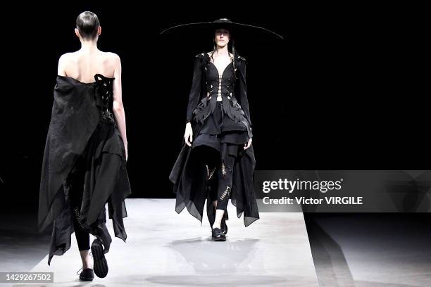France A model walks the runway during the Yohji Yamamoto Ready to Wear Spring Summer 2023 show as part of the Paris Fashion Week on September 30th,...