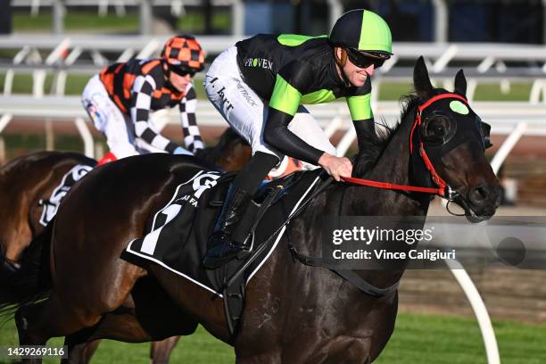 Joshua Parr riding Private Eye winning Race 8, the Gilgai Stakes , during Turnbull Stakes Day at Flemington Racecourse on October 01, 2022 in...