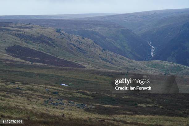 Police guard the area around the dig site on Saddleworth Moor for murder victim Keith Bennett as they investigate suspected human remains on October...