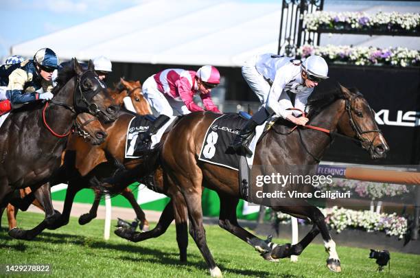 Michael Dee riding Lunar Flare winning Race 6, the The Lexus Bart Cummings, during Turnbull Stakes Day at Flemington Racecourse on October 01, 2022...