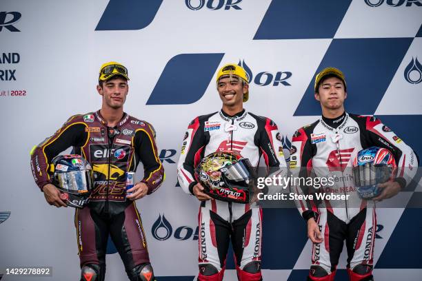 Top 3 riders at parc ferme with Moto2 rider Tony Arbolino of Italy and ELF Marc VDS Racing Team , Moto2 rider Somkiat Chantra of Thailand and...