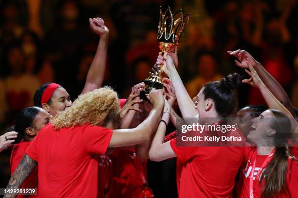 Sabrina Ionescu of the United States and Team USA lift the FIBA Women's Basketball World Cup trophy during the 2022 FIBA Women's Basketball World Cup...