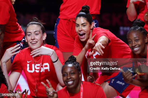 Breanna Stewart, Kelsey Plum, Chelsea Gray and Jewell Loyd of the United States celebrate Team USA winning the gold medal during the 2022 FIBA...