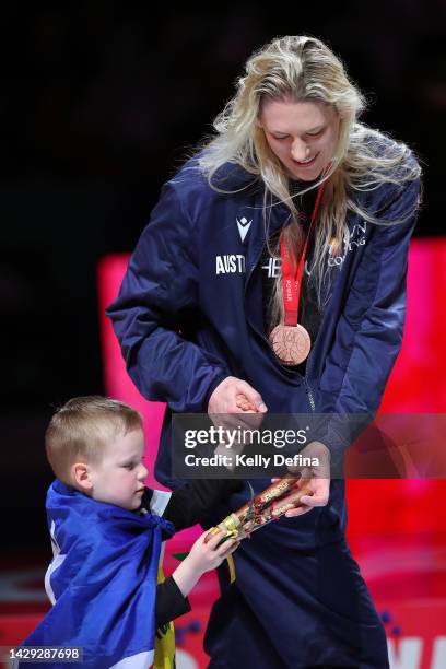 Lauren Jackson of Australia celebrates with her son after Australia win the bronze medal during the 2022 FIBA Women's Basketball World Cup Final...