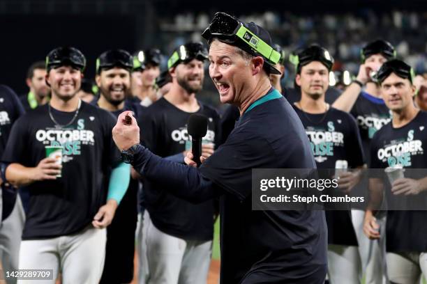 Manager Scott Servais of the Seattle Mariners celebrates after clinching a postseason birth after beating the Oakland Athletics 2-1 at T-Mobile Park...