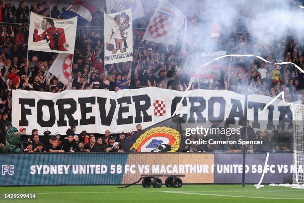 Sydney United fans enjoy the atmosphere during the Australia Cup Final match between Sydney United 58 FC and Macarthur FC at Allianz Stadium on...