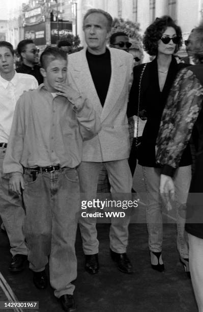 Actor James Caan, Scott Caan, and Ingrid Hajek at the Los Angeles premiere of Batman Returns at Mann's Chinese Theatre on June 16th, 1992.