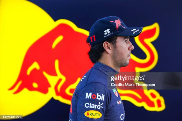 Sergio Perez of Mexico and Oracle Red Bull Racing looks on in the garage during final practice ahead of the F1 Grand Prix of Singapore at Marina Bay...