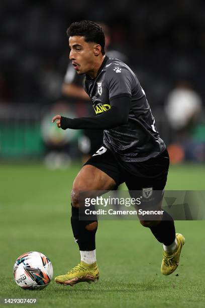 Daniel Arzani of Macarthur FC dribbles the ball during the Australia Cup Final match between Sydney United 58 FC and Macarthur FC at Allianz Stadium...
