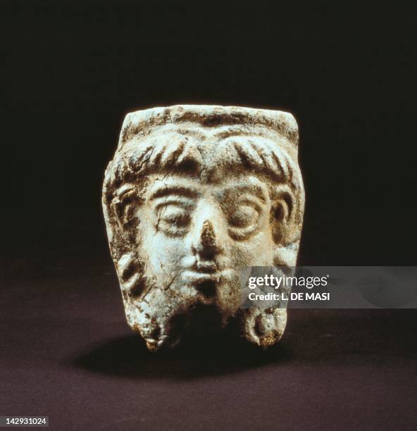 Fragment of an earthenware cup-shaped in the shape of afemale head. Artefact from Ebla. Assyrian civilisation, 1700 BC. Aleppo, Archaeological Museum