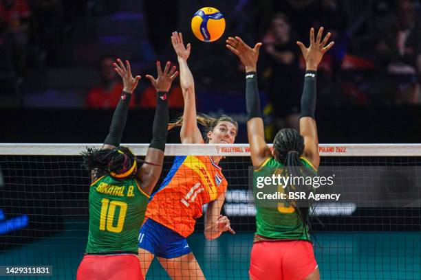 Berthrade Simone Flore Bikatal of Cameroon, Paule Arielle Olomo of Cameroon, Anne Buijs of the Netherlands during the Pool A Phase 1 match between...