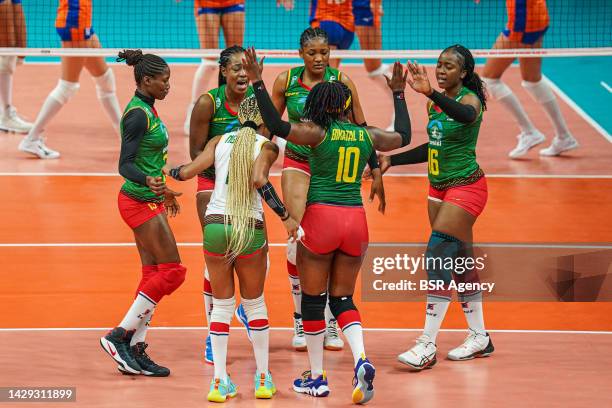 Berthrade Simone Flore Bikatal of Cameroon, Estelle Adiana of Cameroon, players of Cameroon celebrate during the Pool A Phase 1 match between...